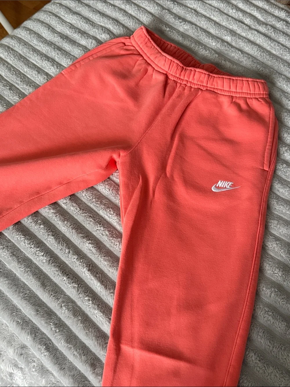 Nike Coral Track Joggers with White Logo